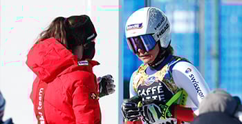 Corinne talking to a Swiss-Ski teammember